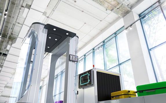 A modern metal detector at a security gate.