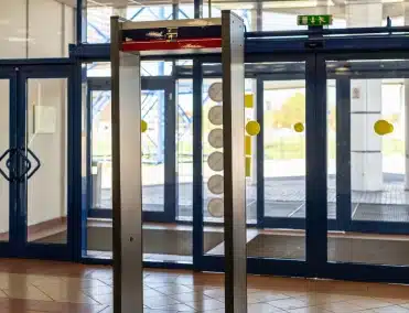 metal detector at the doors of a tile entryway